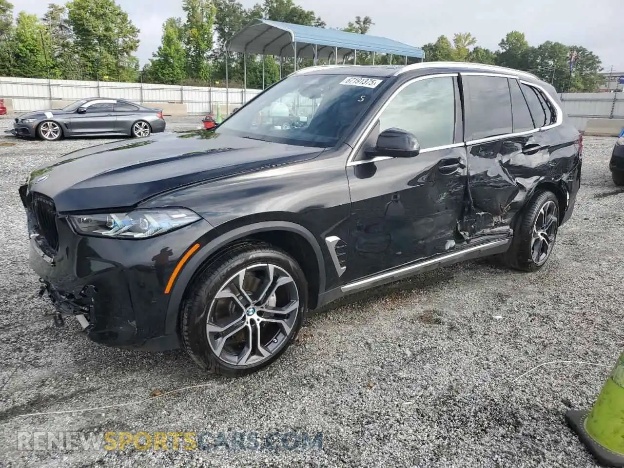 1 Photograph of a damaged car 5UX23EU07R9S31556 BMW X5 2024