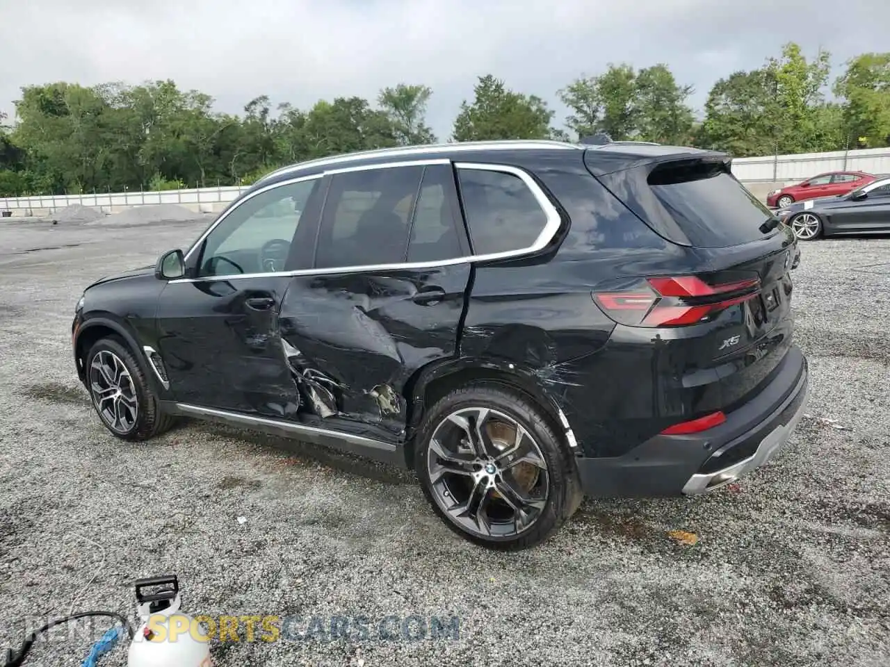 2 Photograph of a damaged car 5UX23EU07R9S31556 BMW X5 2024