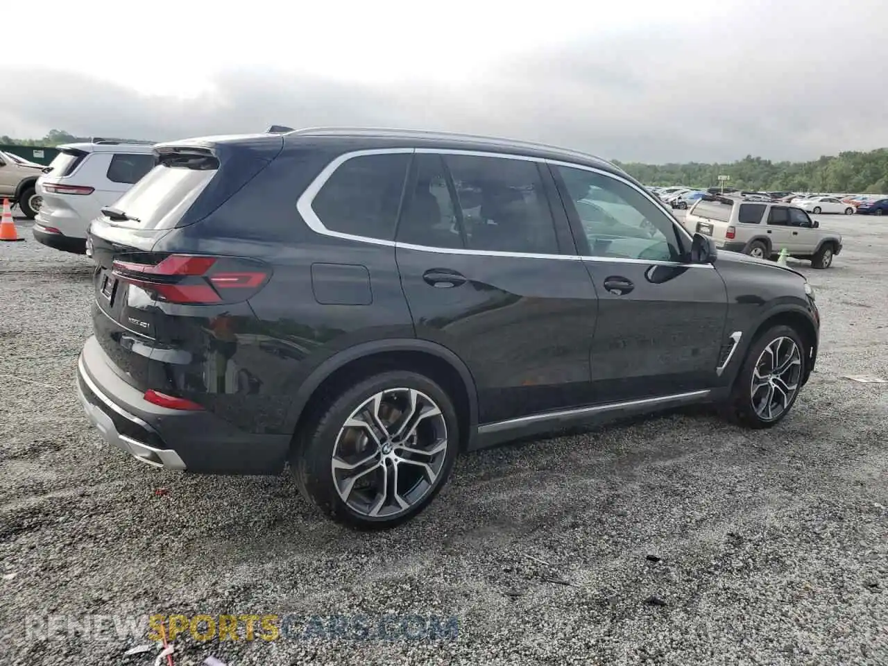 3 Photograph of a damaged car 5UX23EU07R9S31556 BMW X5 2024