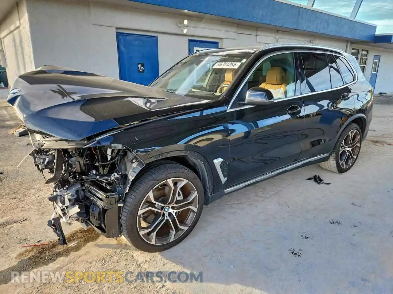 1 Photograph of a damaged car 5UX23EU07R9U69309 BMW X5 2024