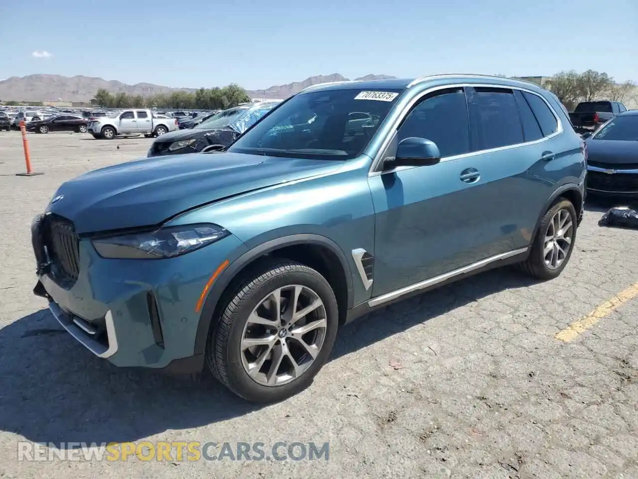 1 Photograph of a damaged car 5UX23EU07R9V90728 BMW X5 2024