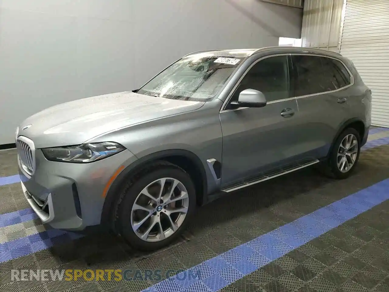 1 Photograph of a damaged car 5UX23EU09R9T34817 BMW X5 2024