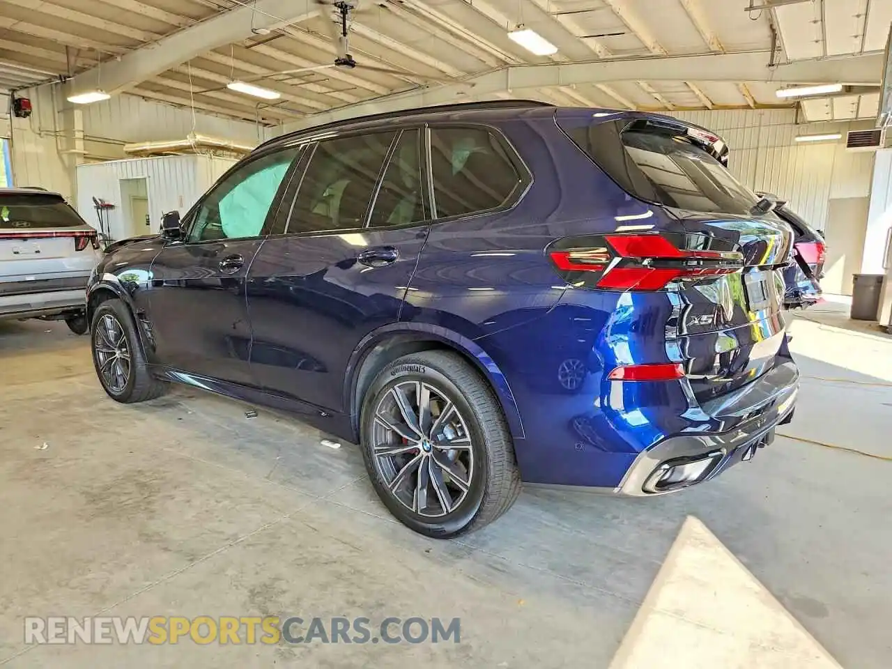 2 fotografías del automóvil dañado 5UX23EU03S9Y59989 BMW X5 2025