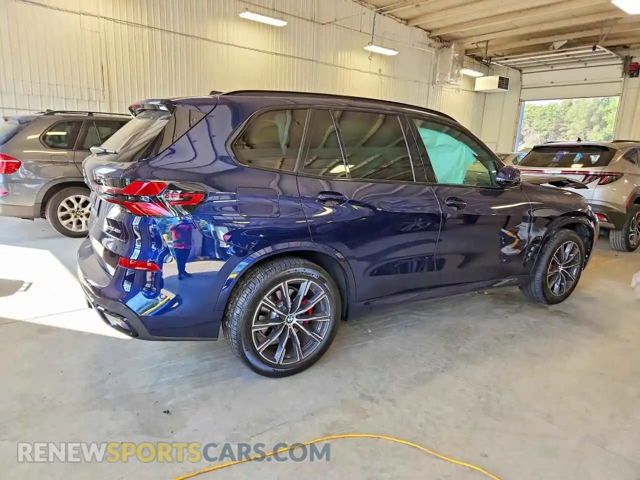 3 fotografías del automóvil dañado 5UX23EU03S9Y59989 BMW X5 2025
