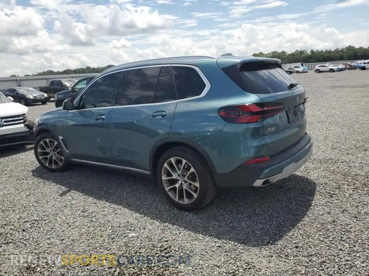 2 Photograph of a damaged car 5UX23EU0XS9Y20848 BMW X5 2025