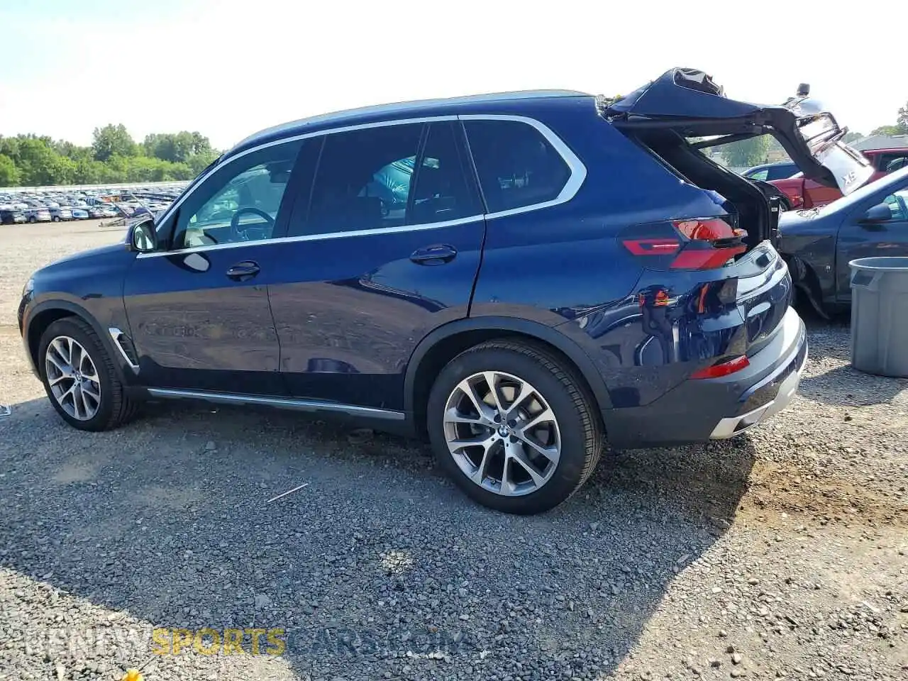 2 fotografías del automóvil dañado 5UX23EU02T9055166 BMW X5 2026