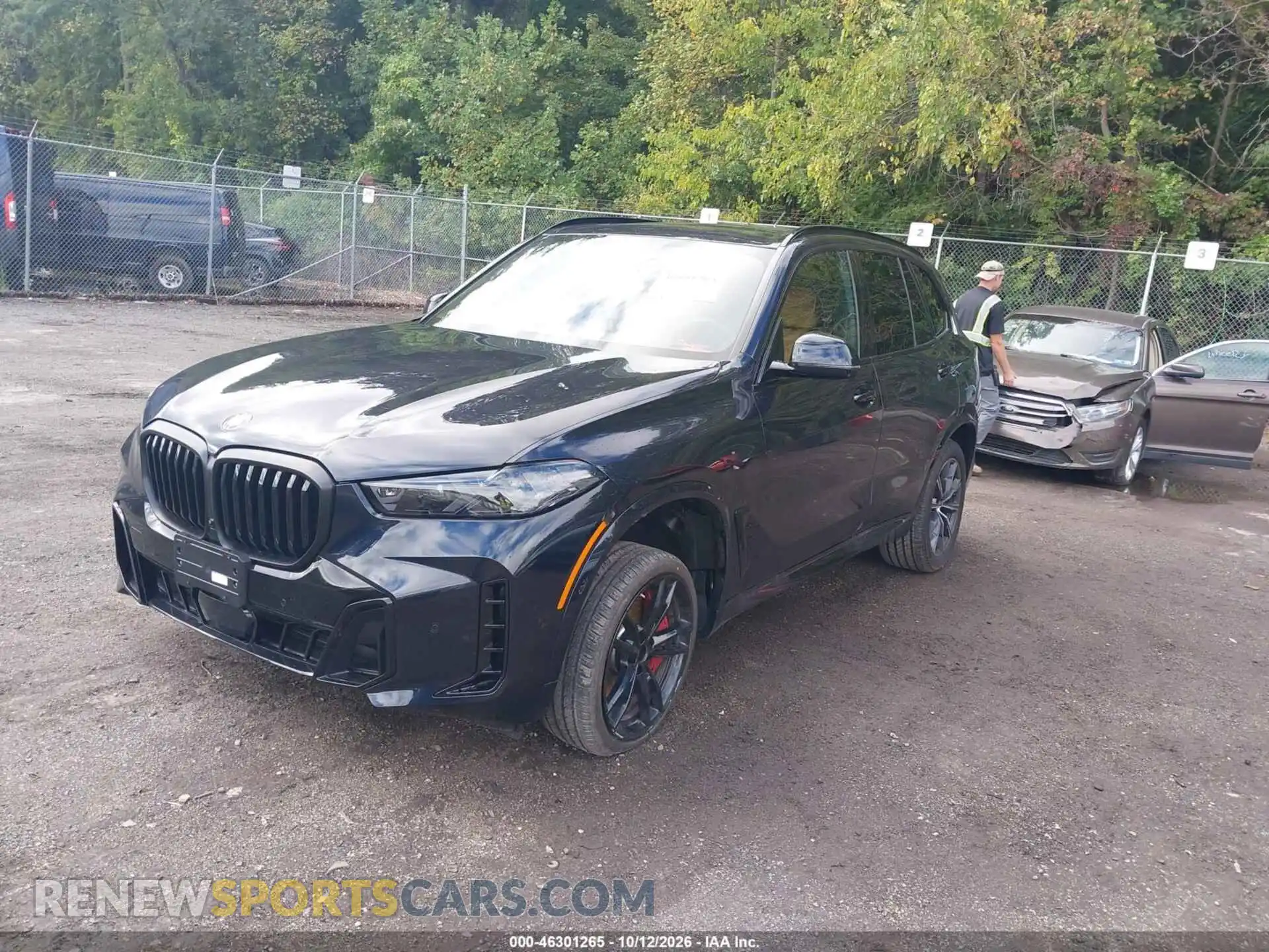 2 fotografías del automóvil dañado 5UX23EU0XT9538498 BMW X5 2026