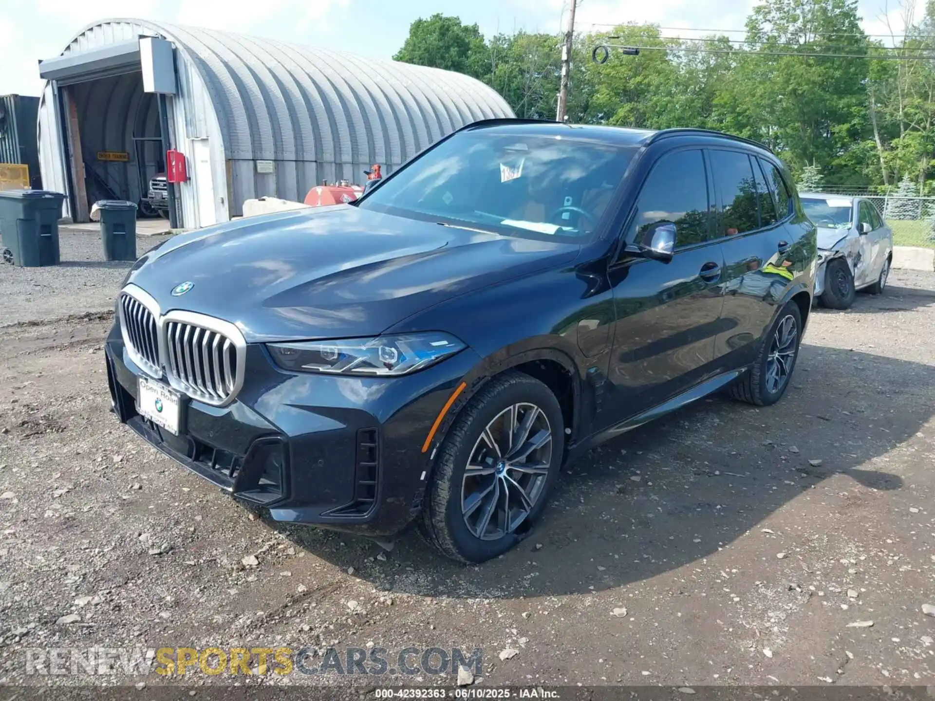 2 fotografías del automóvil dañado 5UX43EU04R9T21997 BMW X5 PHEV 2024