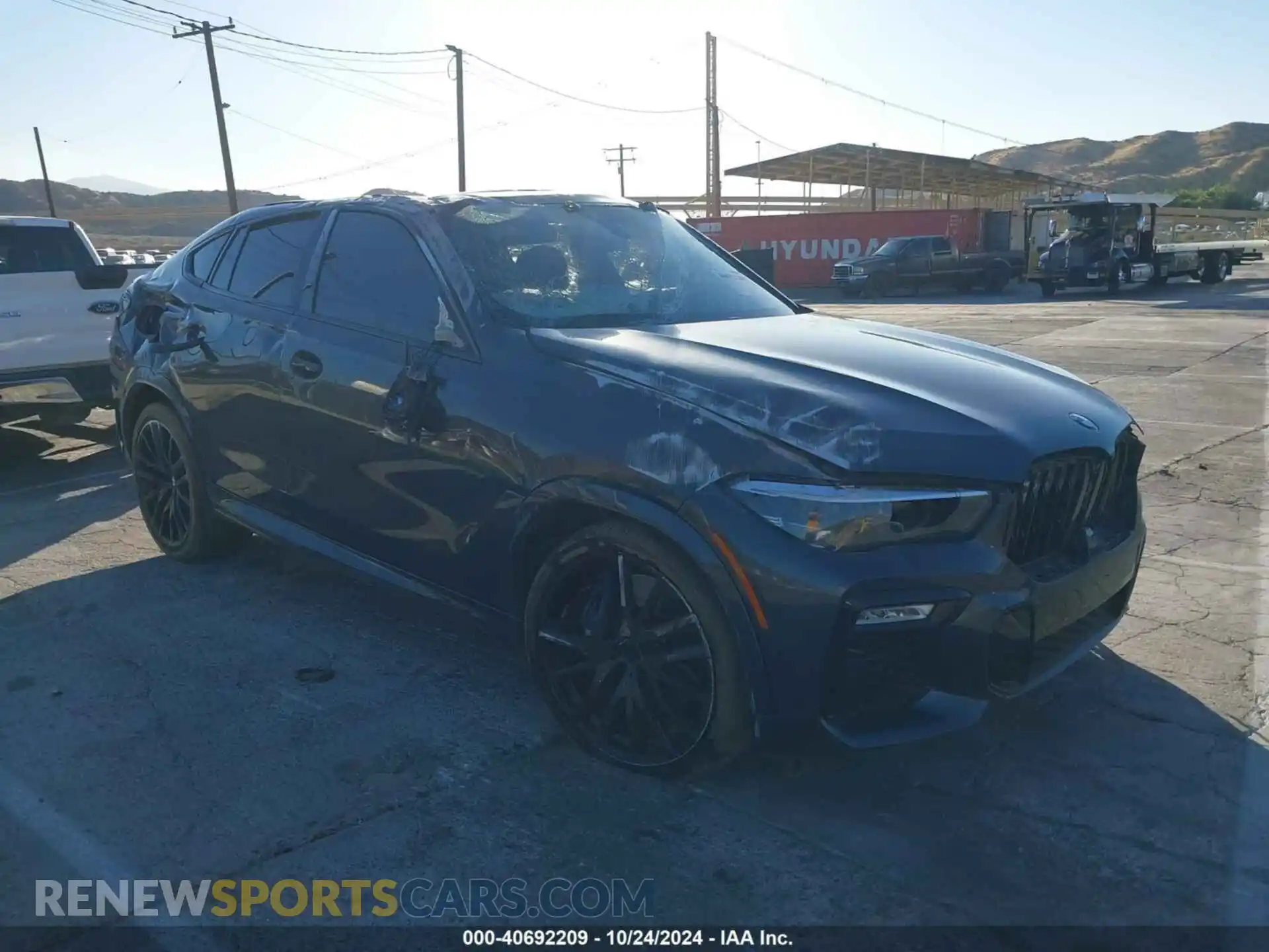 1 Photograph of a damaged car 5UXCY6C01L9C67072 BMW X6 2020