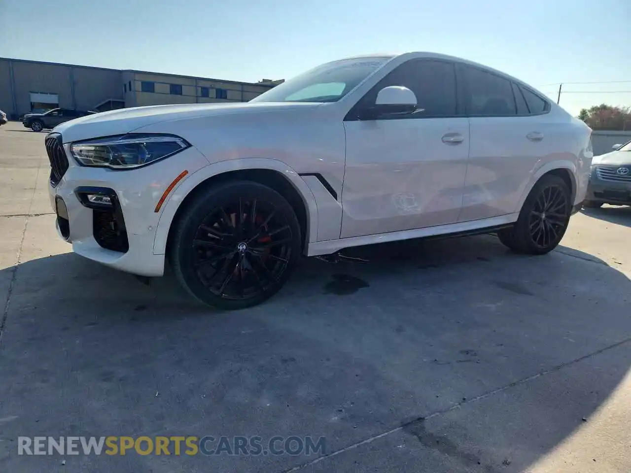 1 Photograph of a damaged car 5UXCY6C02M9H72135 BMW X6 2021