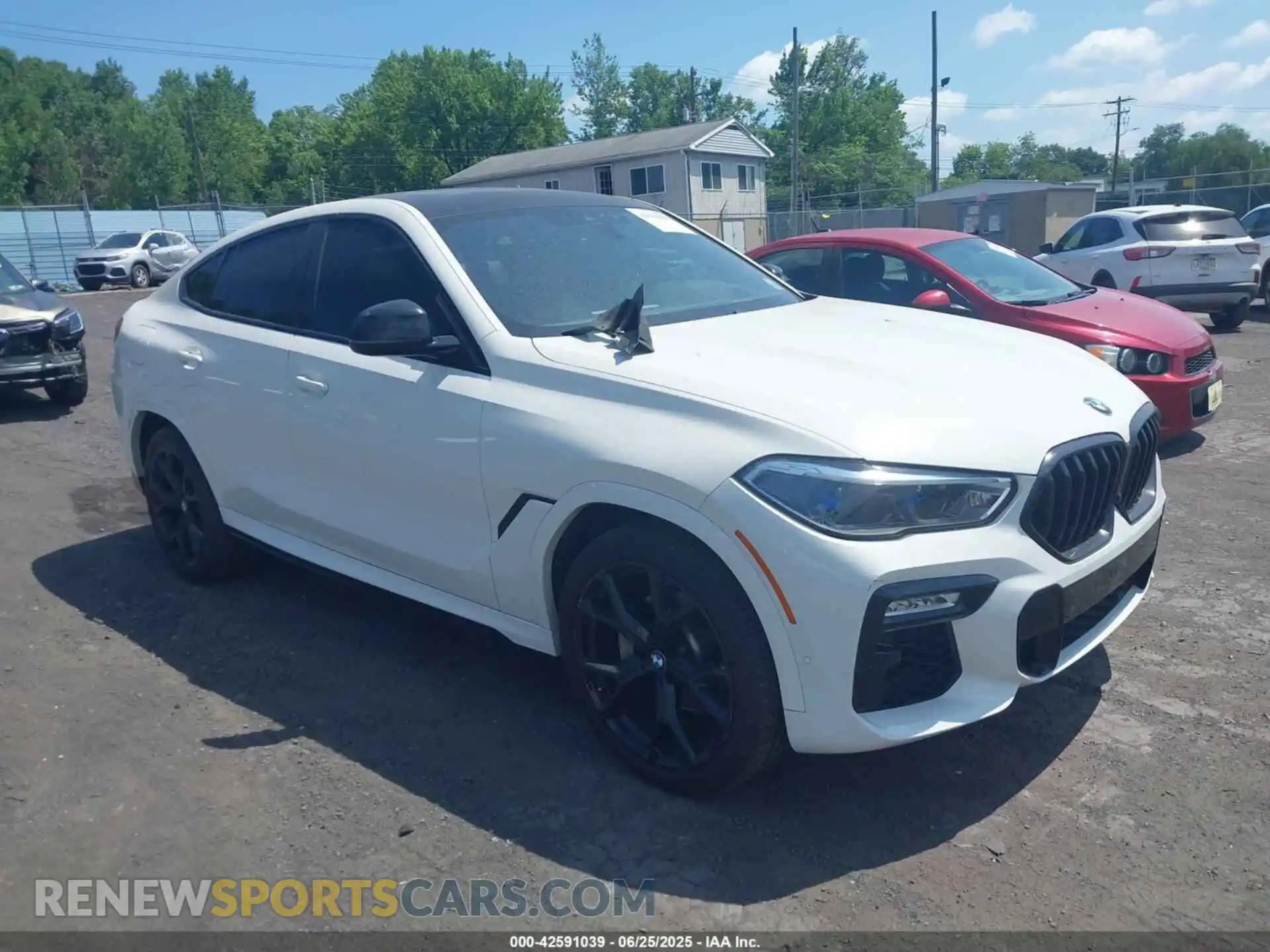 1 Photograph of a damaged car 5UXCY6C04M9G74224 BMW X6 2021