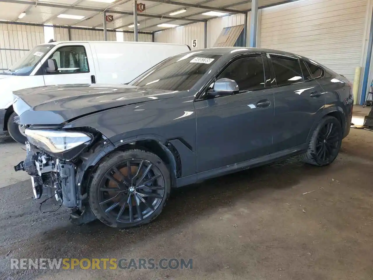 1 Photograph of a damaged car 5UXCY8C04M9H56319 BMW X6 2021