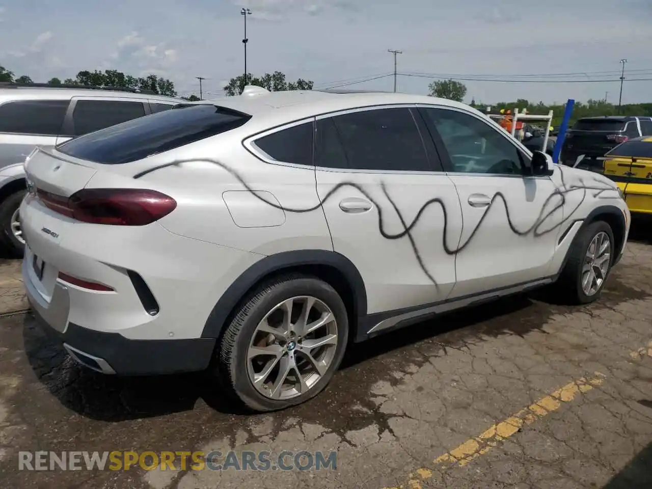 3 Photograph of a damaged car 5UXCY6C05N9K11233 BMW X6 2022