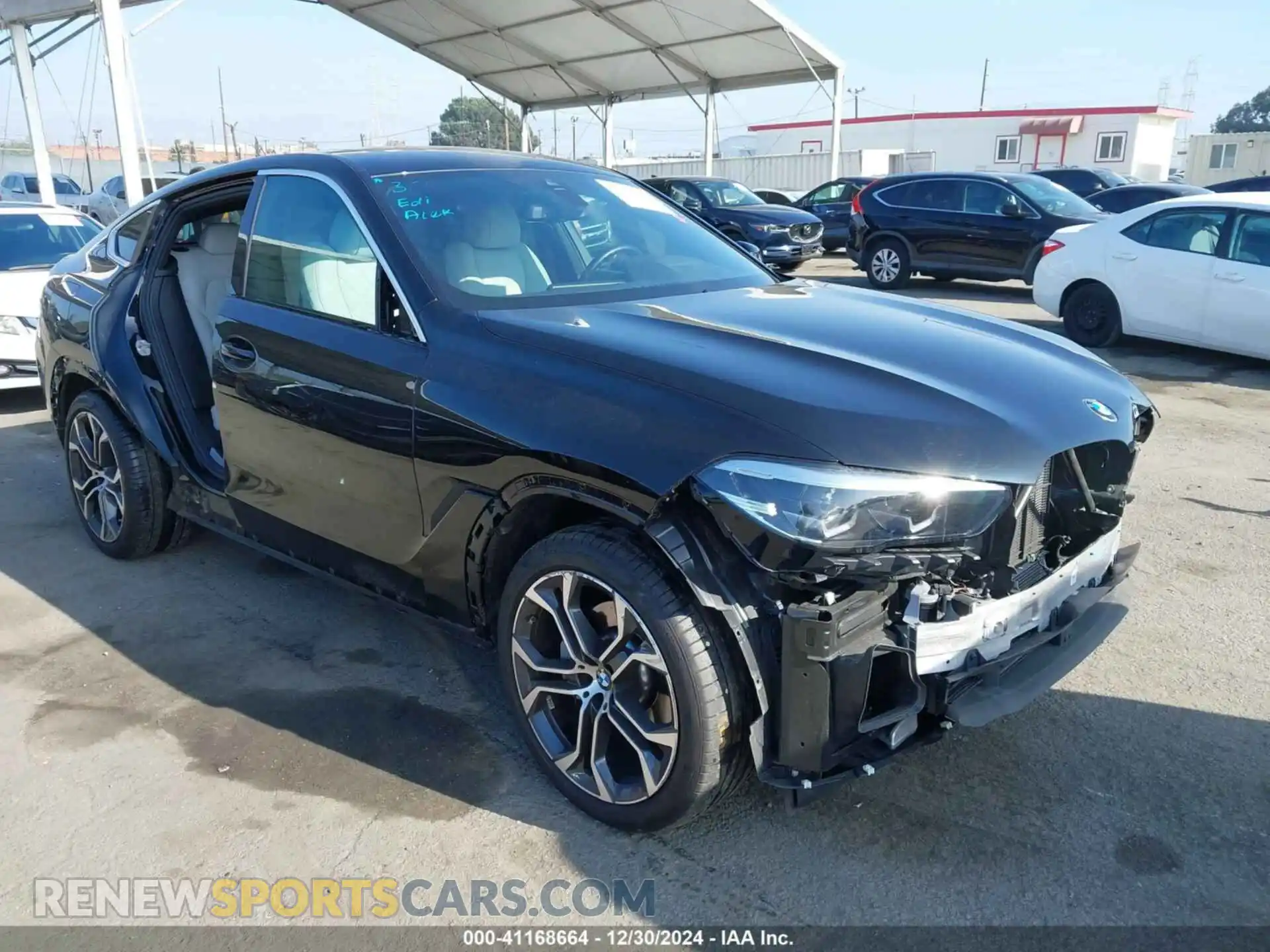1 Photograph of a damaged car 5UXCY6C02P9P94265 BMW X6 2023