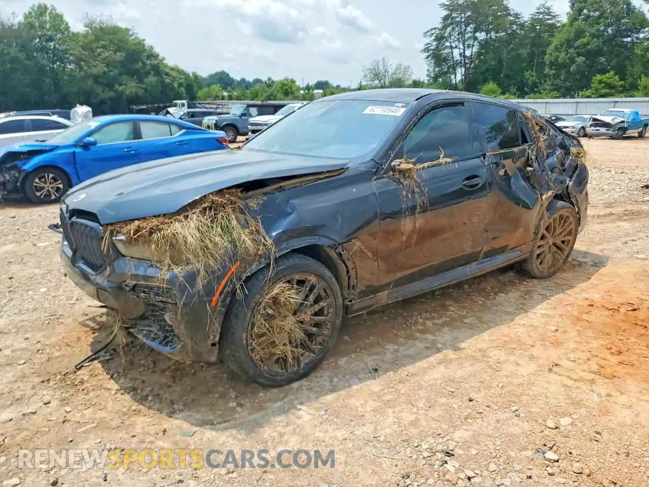 1 Photograph of a damaged car 5UXCY8C09P9P62909 BMW X6 2023