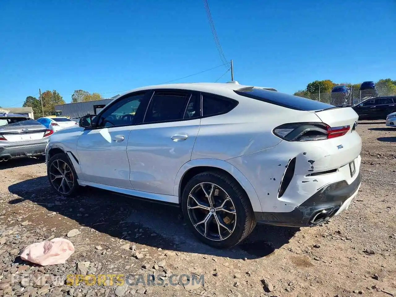 2 Photograph of a damaged car 5UX43EX00R9V32223 BMW X6 2024