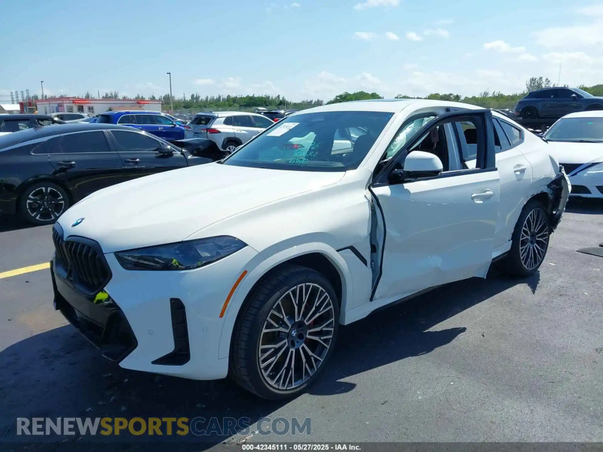 2 Photograph of a damaged car 5UX33EX08S9Y77470 BMW X6 2025