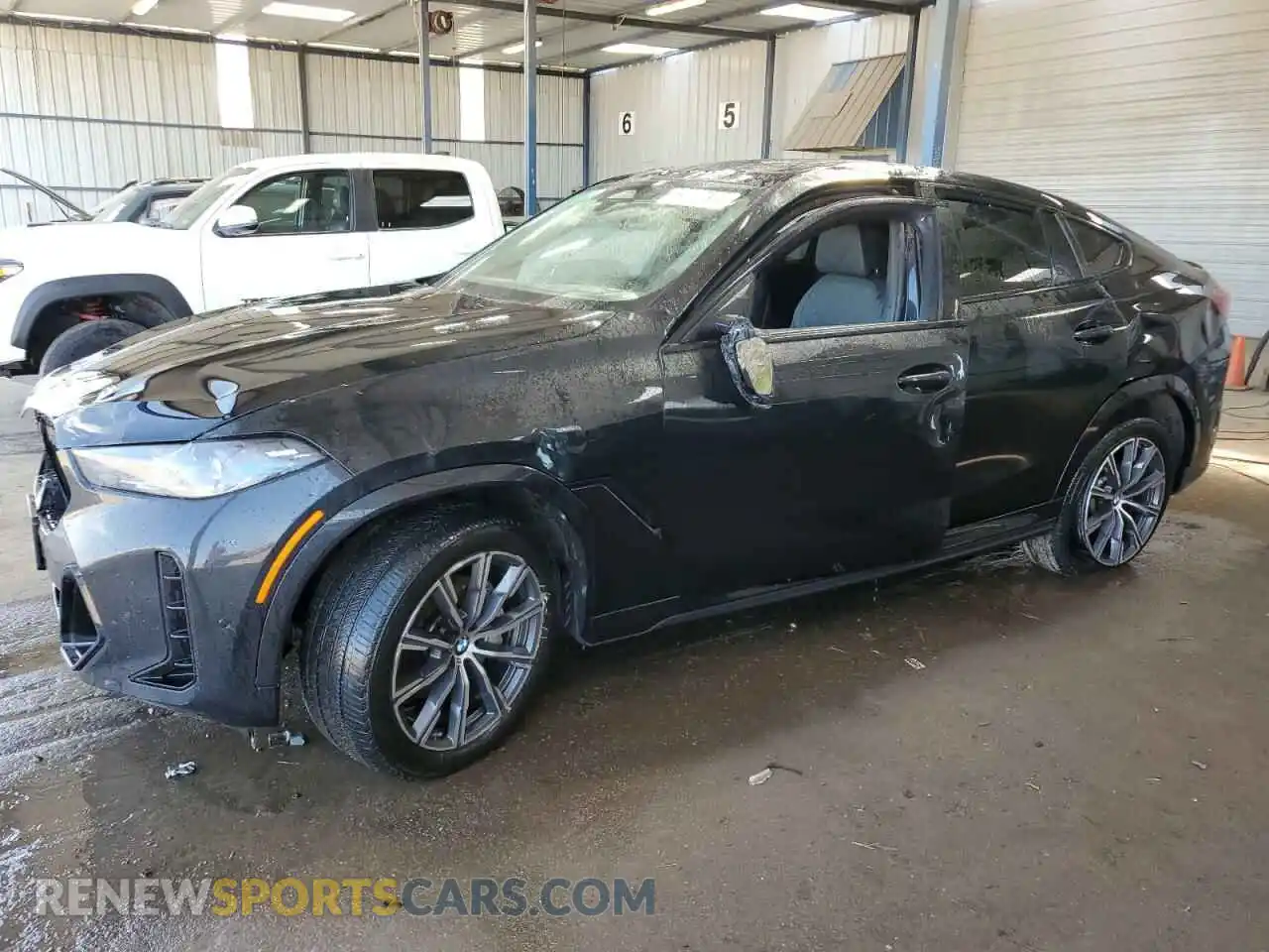 1 Photograph of a damaged car 5UX33EX09S9X00975 BMW X6 2025
