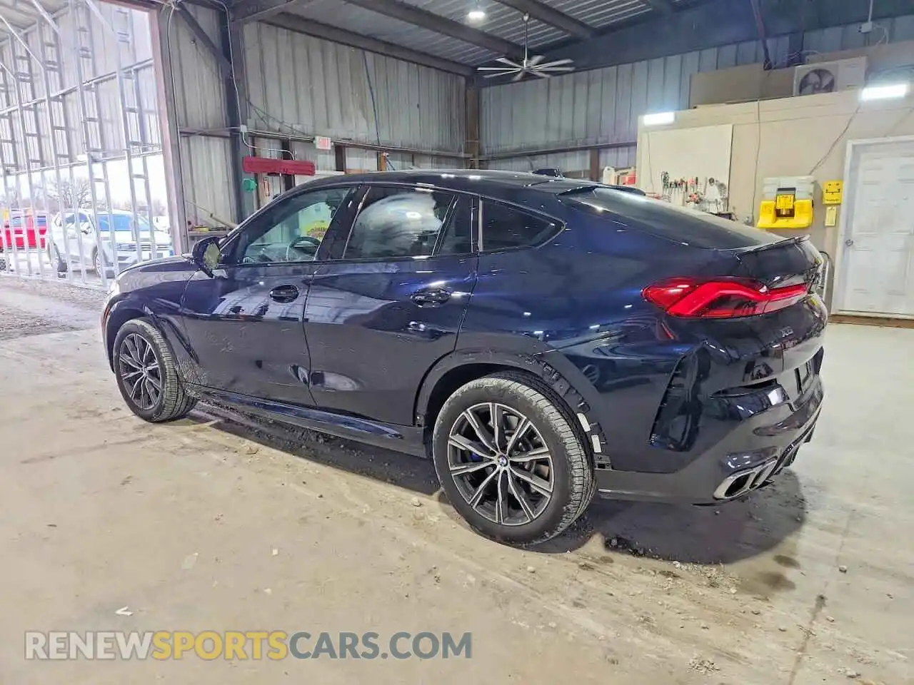 2 Photograph of a damaged car 5UX43EX09S9Y95769 BMW X6 2025