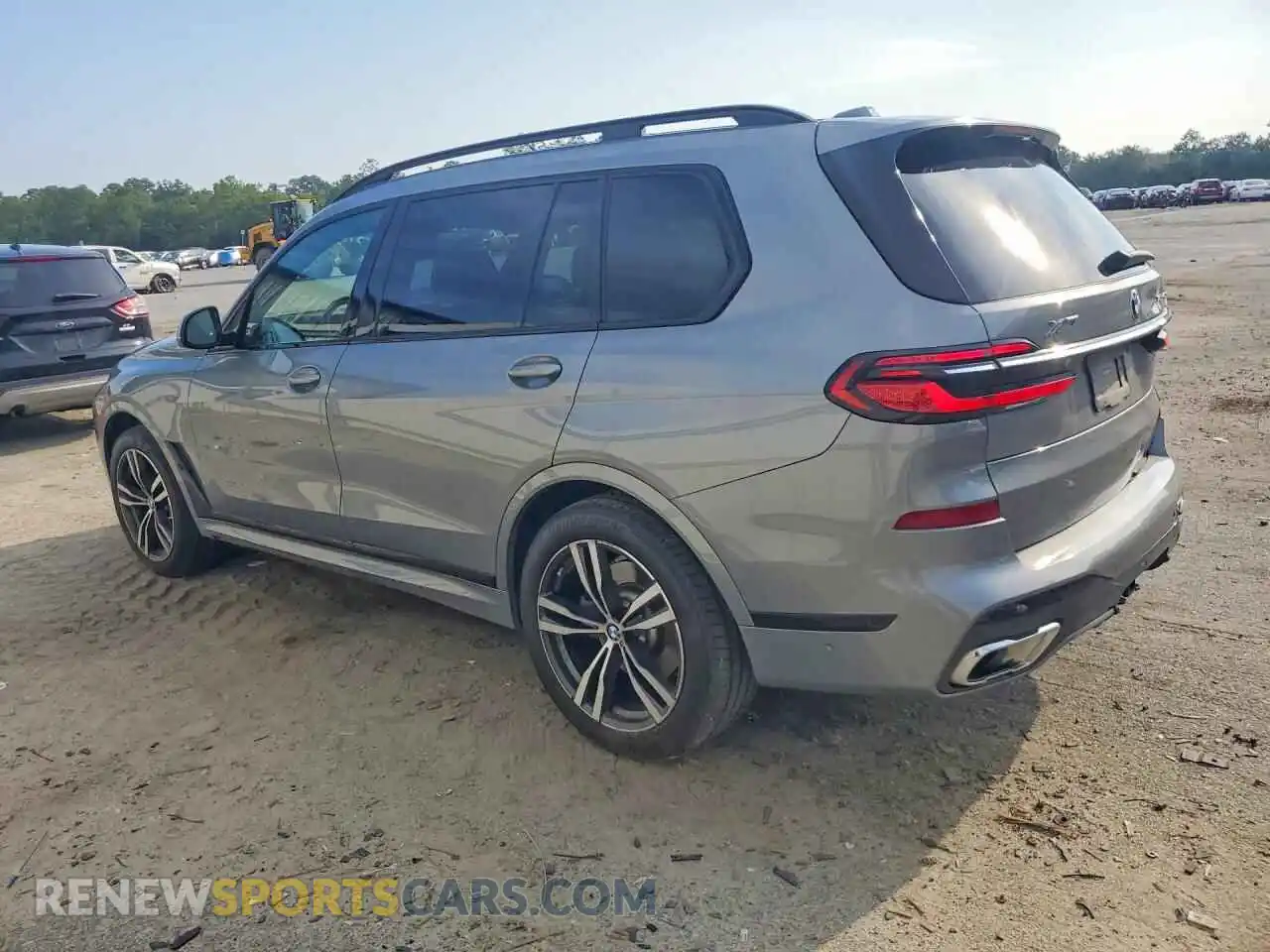 2 fotografías del automóvil dañado 5UX23EM04P9R40684 BMW X7 2023