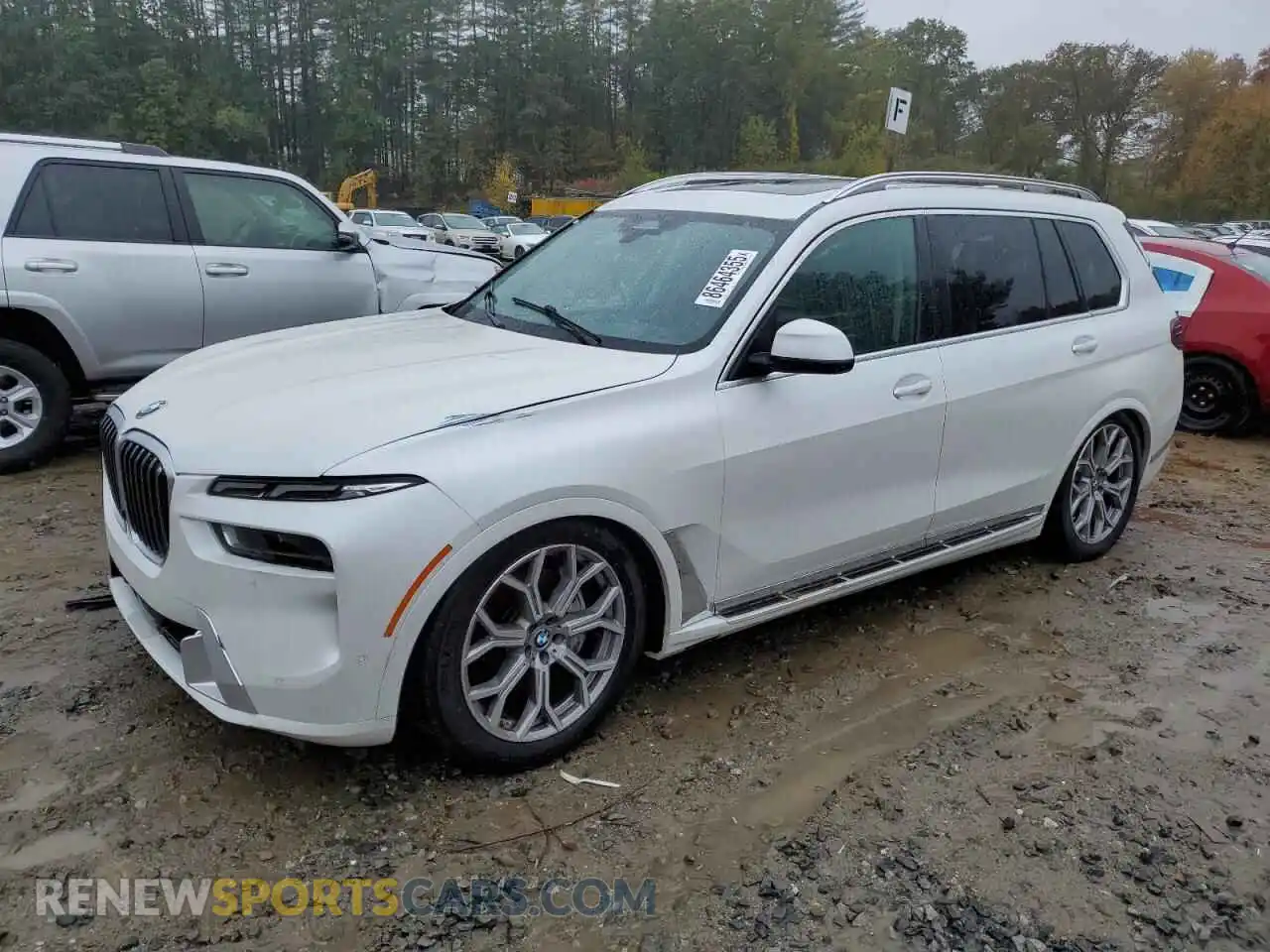1 Photograph of a damaged car 5UX23EM05P9P12225 BMW X7 2023