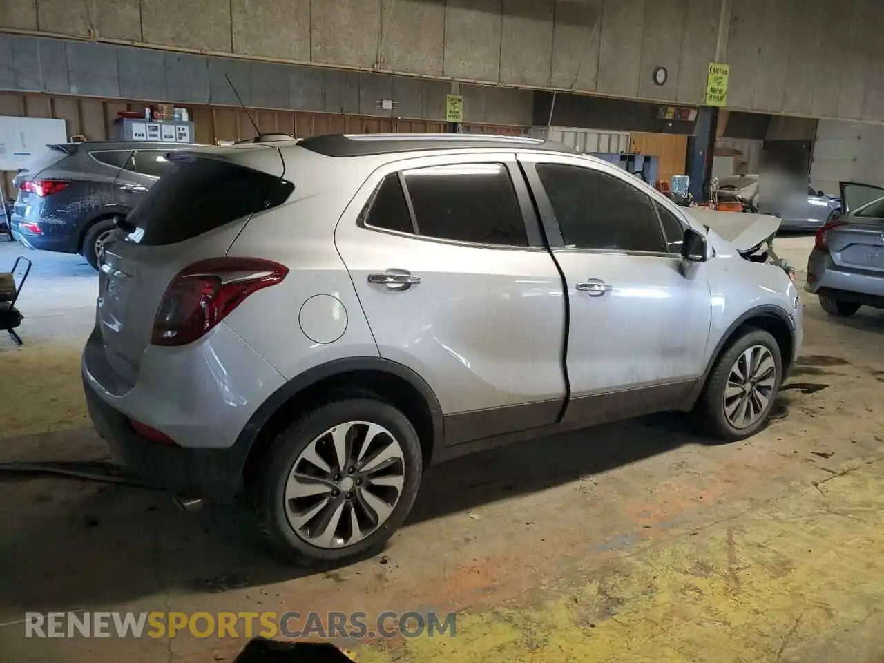 3 fotografías del automóvil dañado KL4CJESM6NB554804 BUICK ENCORE 2022