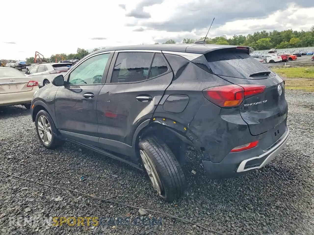 2 fotografías del automóvil dañado KL4MMBS22PB053338 BUICK ENCORE 2023