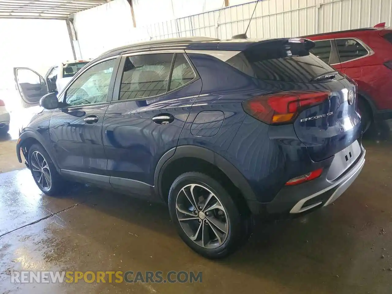 2 fotografías del automóvil dañado KL4MMDS21PB097519 BUICK ENCORE 2023