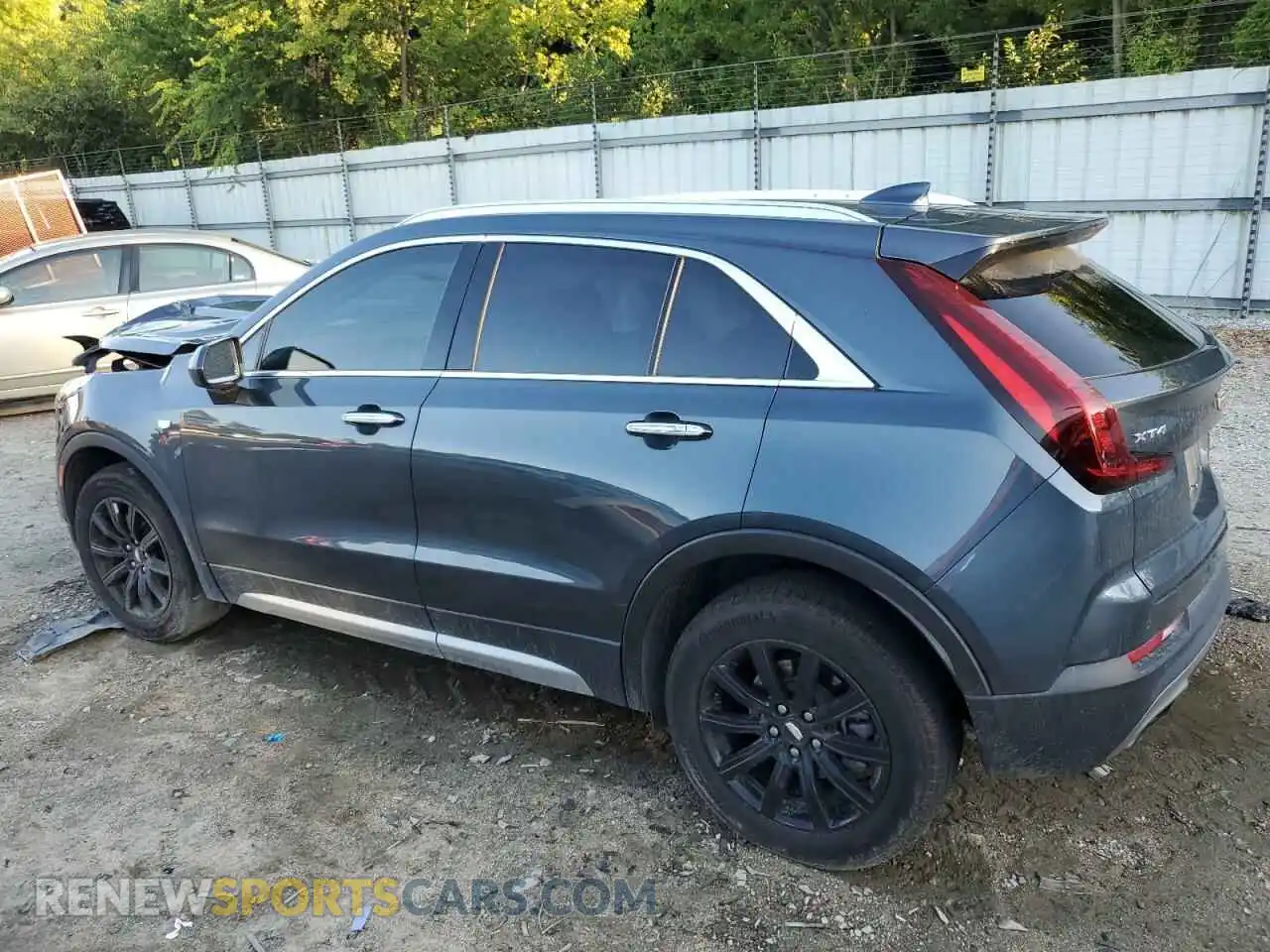 2 fotografías del automóvil dañado 1GYFZCR47KF123621 CADILLAC XT4 2019