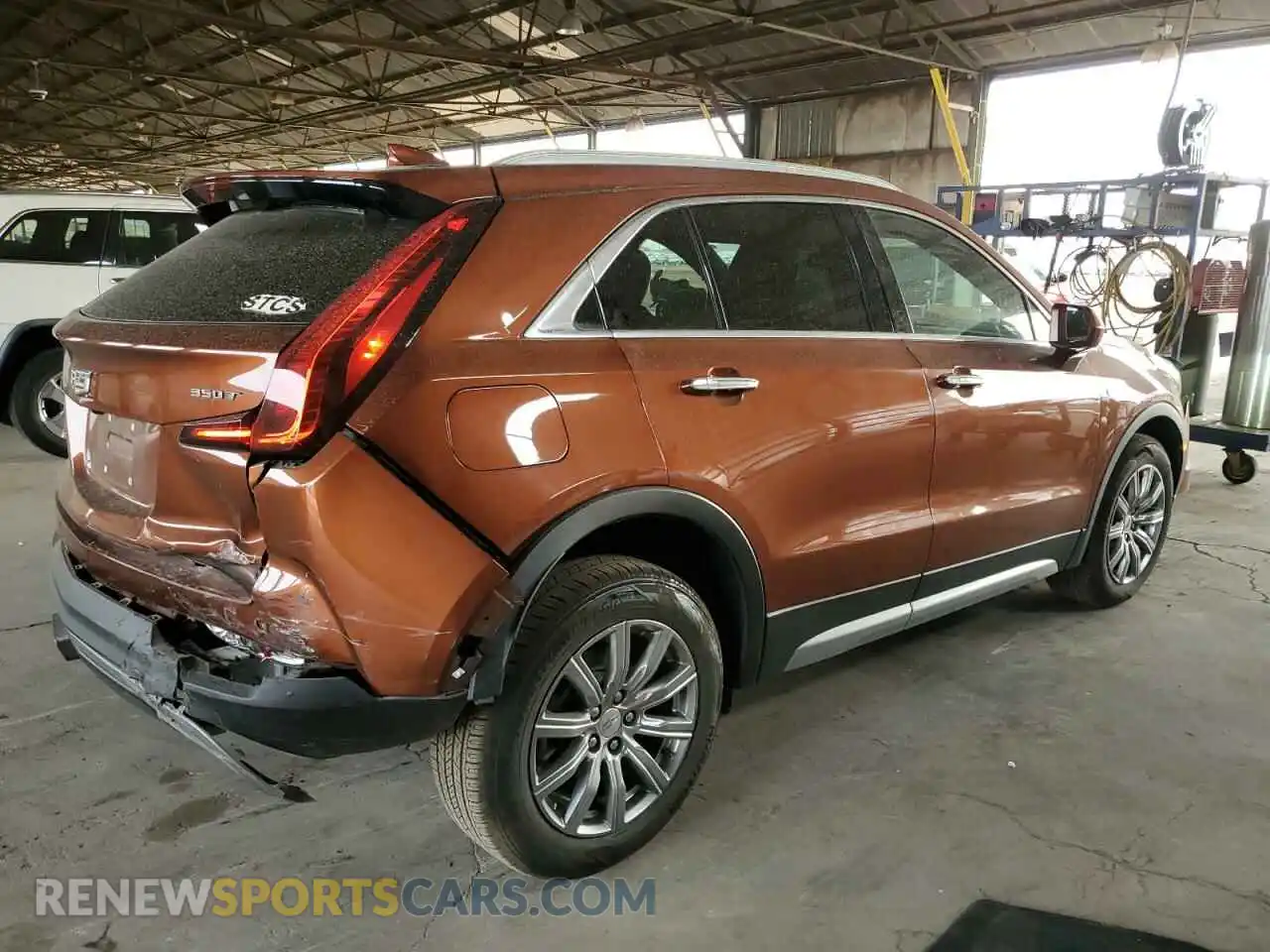 3 Photograph of a damaged car 1GYFZCR47LF112796 CADILLAC XT4 2020