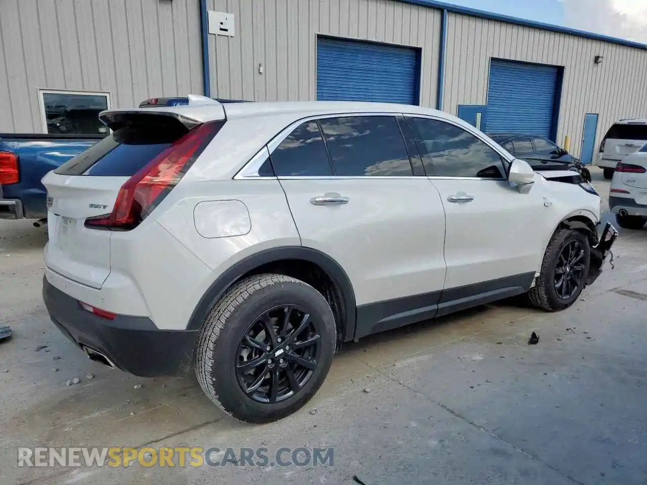 3 Photograph of a damaged car 1GYAZAR40MF051288 CADILLAC XT4 2021