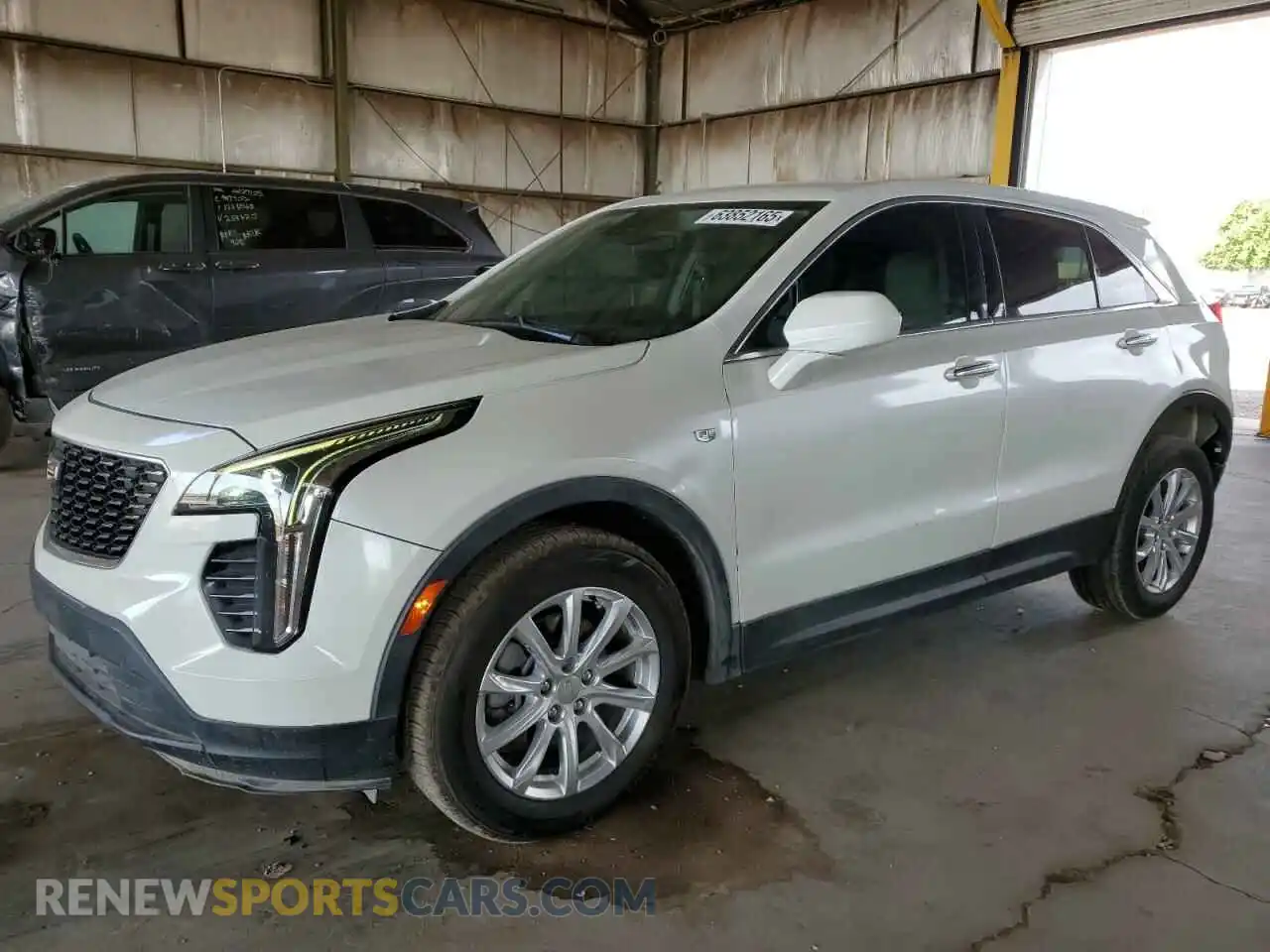 1 Photograph of a damaged car 1GYAZAR46MF000913 CADILLAC XT4 2021
