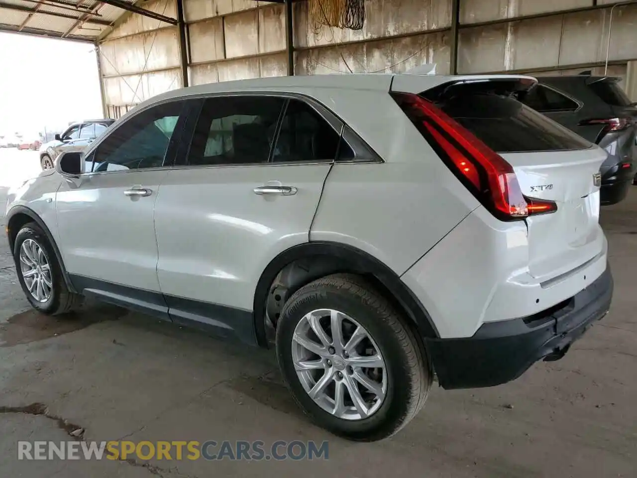 2 Photograph of a damaged car 1GYAZAR46MF000913 CADILLAC XT4 2021
