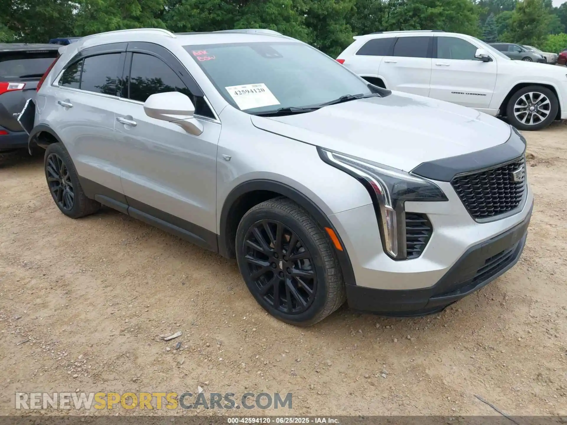 1 Photograph of a damaged car 1GYFZBR40MF061203 CADILLAC XT4 2021