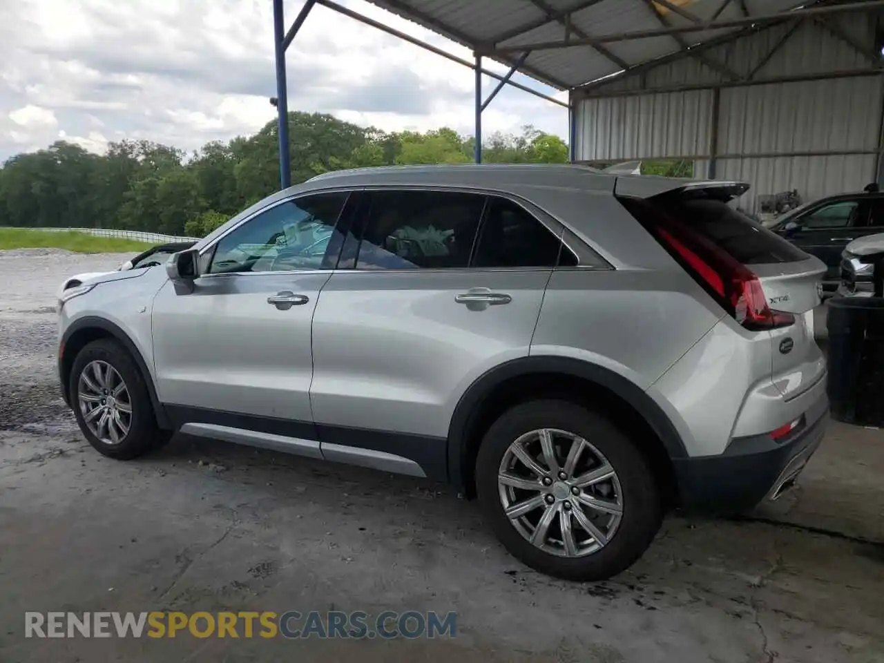 2 Photograph of a damaged car 1GYFZCR40MF002609 CADILLAC XT4 2021