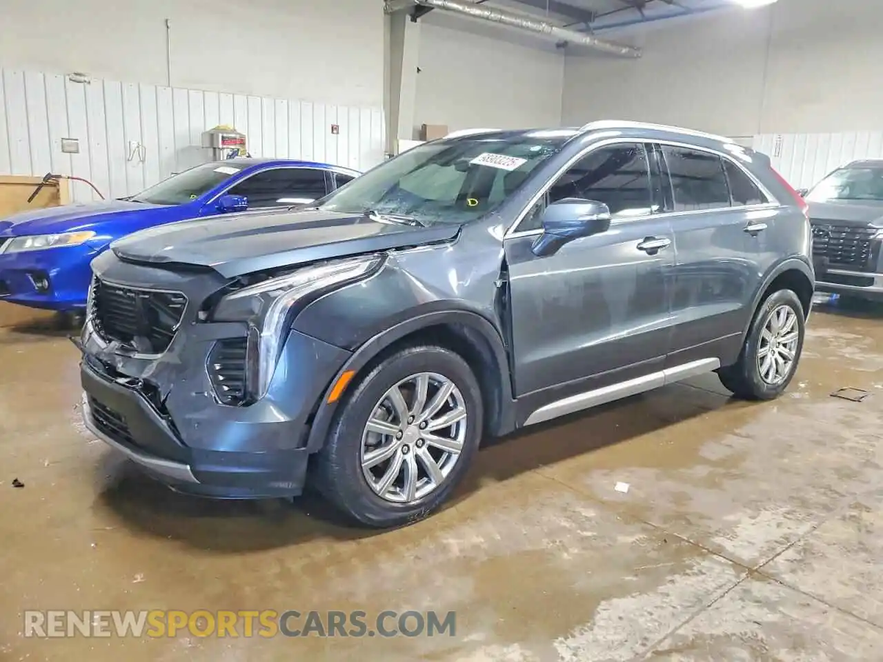 1 Photograph of a damaged car 1GYFZCR40MF034928 CADILLAC XT4 2021