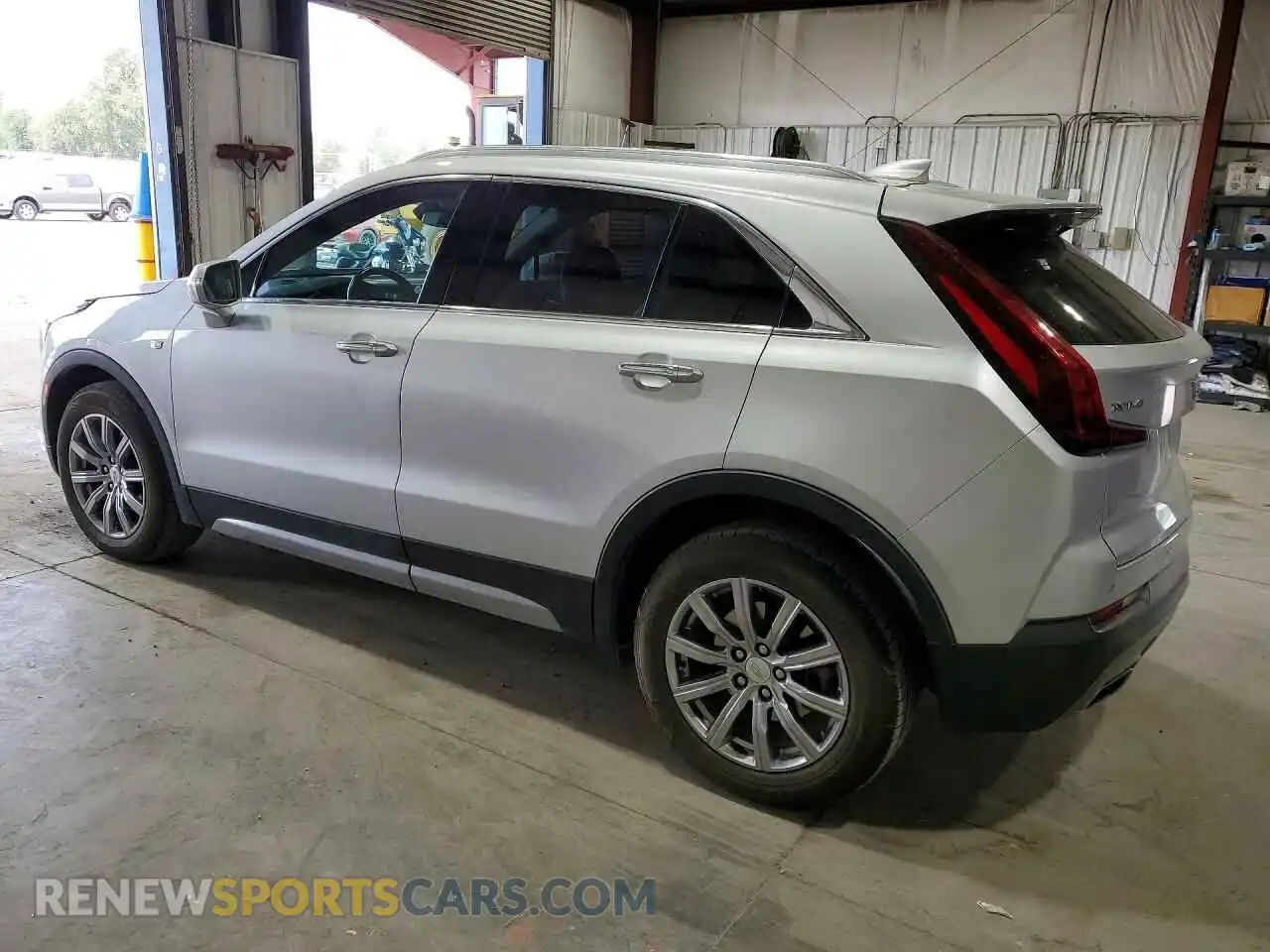2 fotografías del automóvil dañado 1GYFZCR46MF000122 CADILLAC XT4 2021