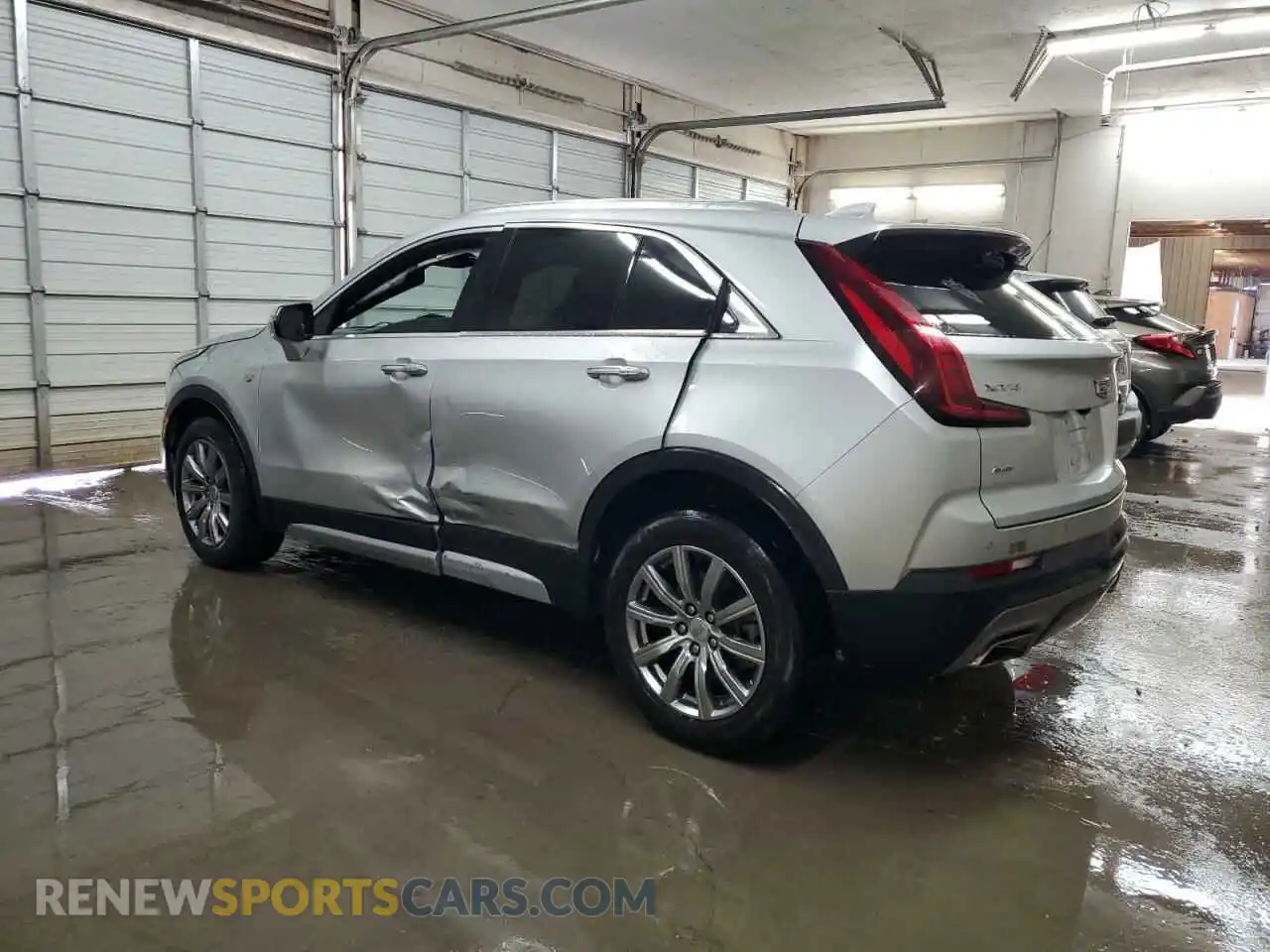 2 Photograph of a damaged car 1GYFZDR4XMF067733 CADILLAC XT4 2021