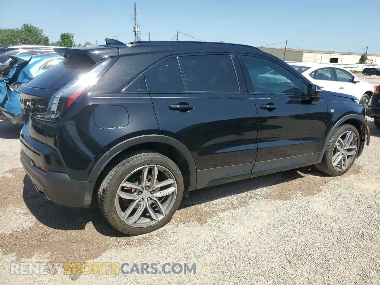 3 Photograph of a damaged car 1GYFZER44MF015908 CADILLAC XT4 2021