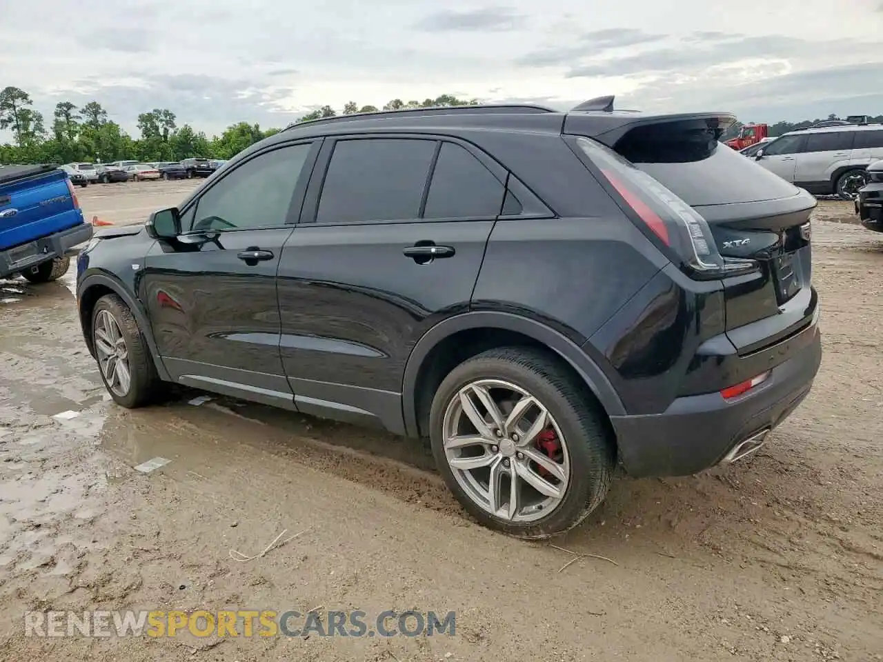 2 fotografías del automóvil dañado 1GYFZER48MF034297 CADILLAC XT4 2021