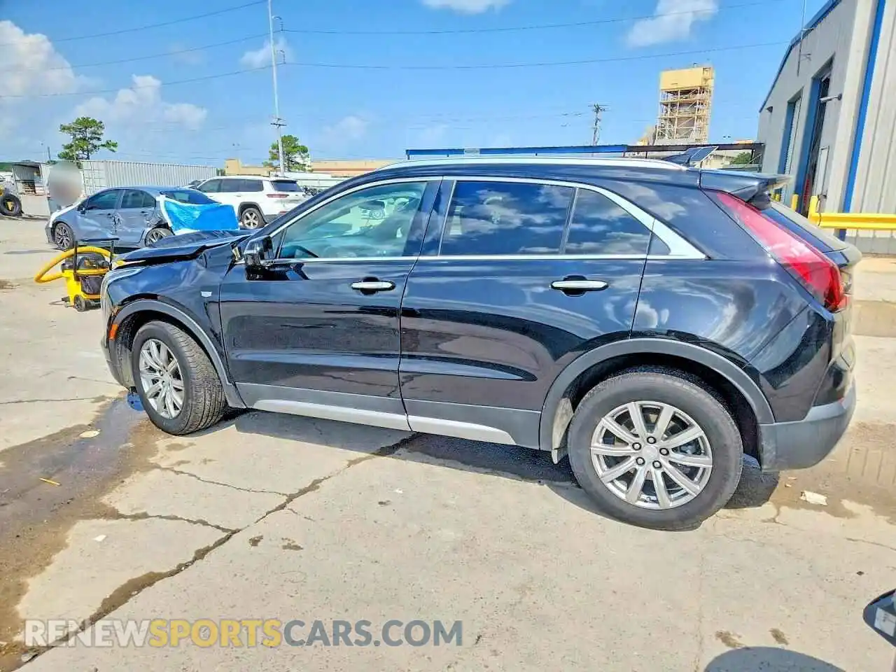 2 Photograph of a damaged car 1GYFZCR44NF100981 CADILLAC XT4 2022
