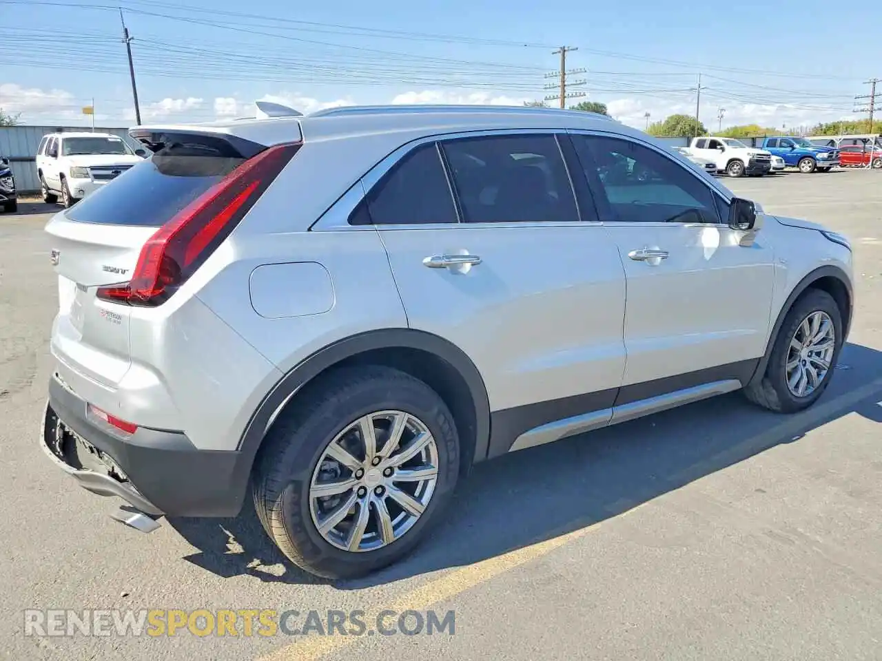 3 Photograph of a damaged car 1GYFZDR48NF102240 CADILLAC XT4 2022