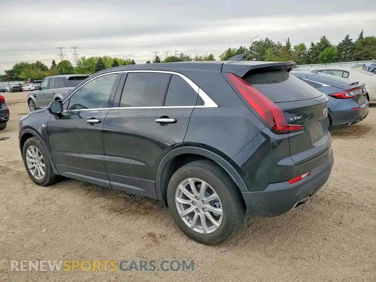 2 fotografías del automóvil dañado 1GYAZAR40PF142355 CADILLAC XT4 2023