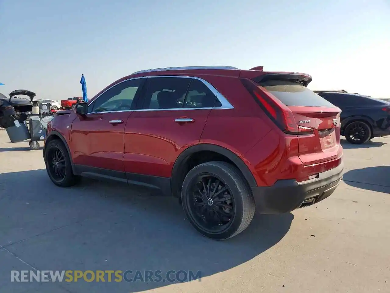 2 fotografías del automóvil dañado 1GYAZAR41PF108926 CADILLAC XT4 2023