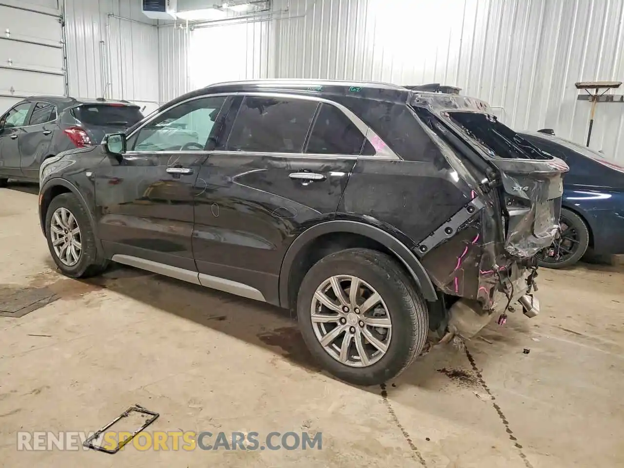 2 fotografías del automóvil dañado 1GYFZDR41PF147717 CADILLAC XT4 2023