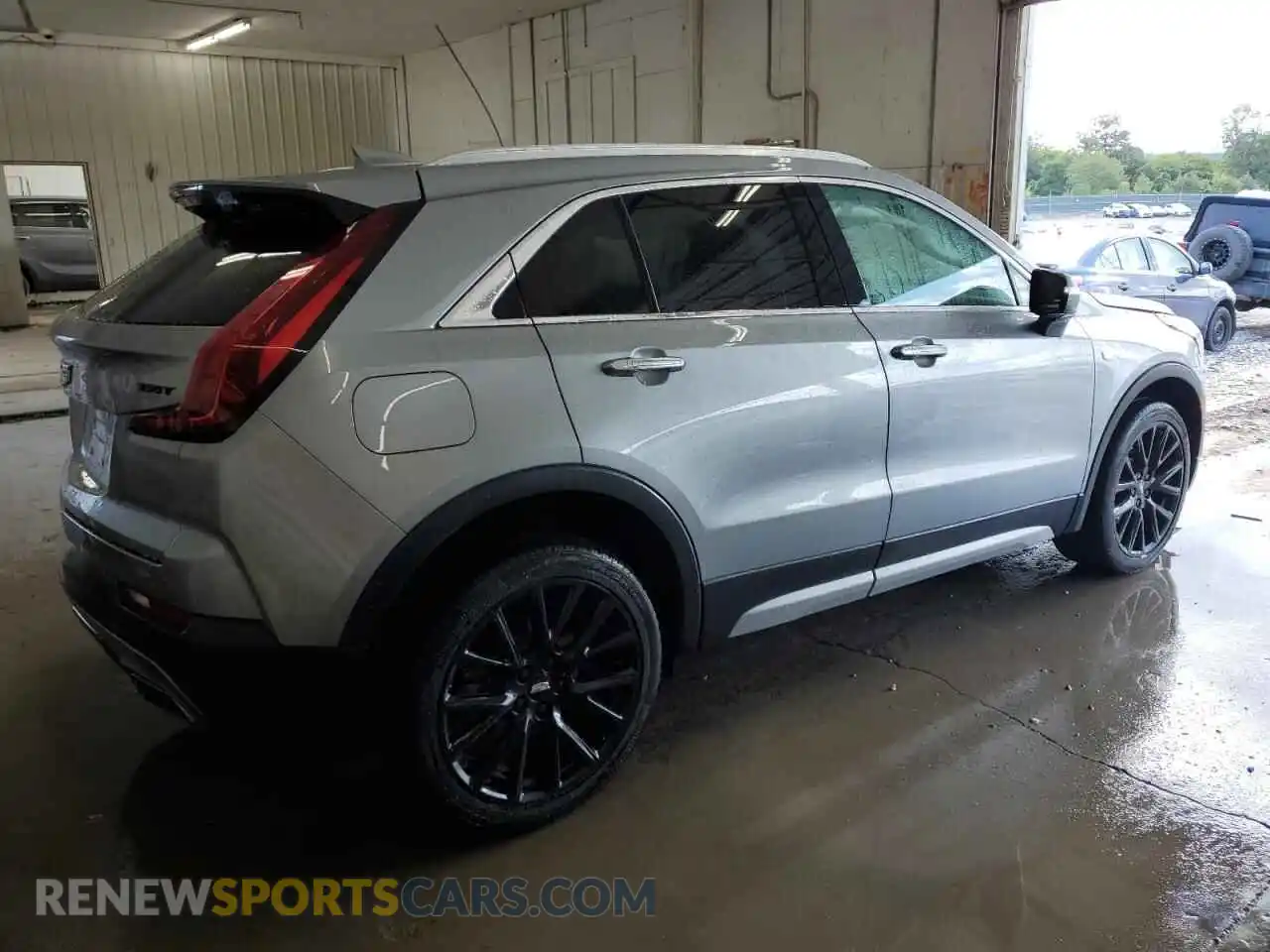 3 Photograph of a damaged car 1GYFZDR43PF222918 CADILLAC XT4 2023