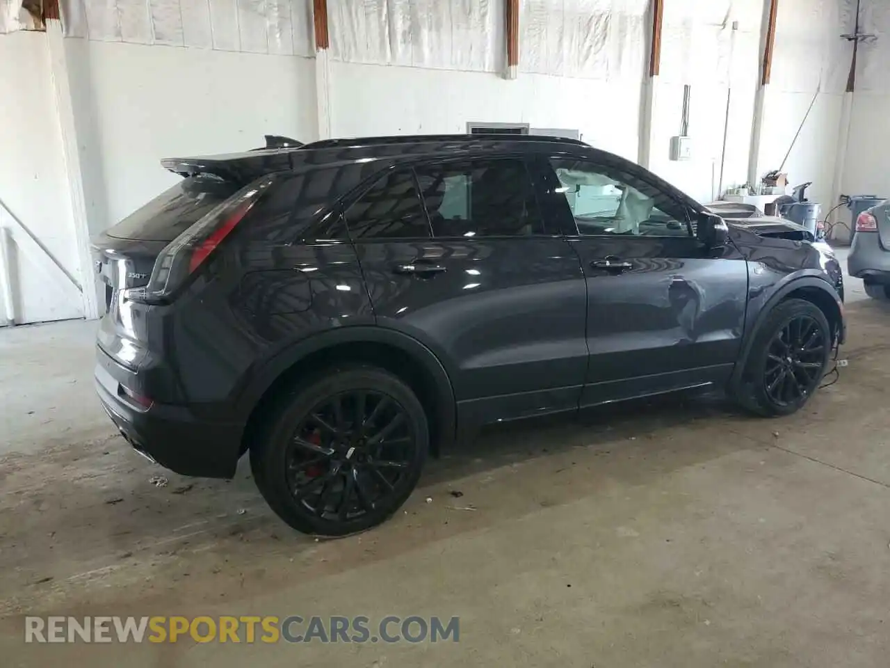 3 Photograph of a damaged car 1GYFZFR41PF103650 CADILLAC XT4 2023
