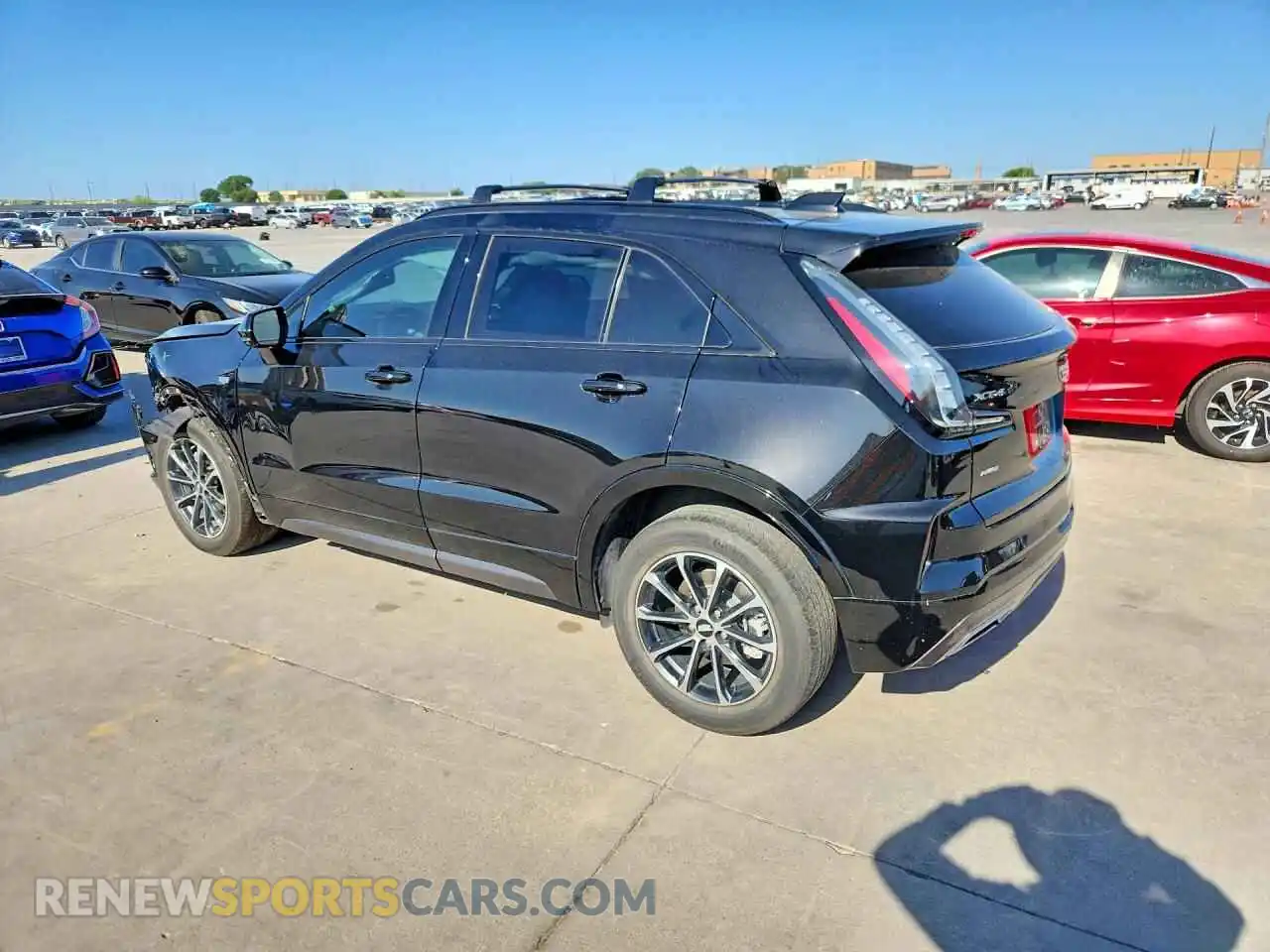 2 fotografías del automóvil dañado 1GYFZFR45RF181822 CADILLAC XT4 2024