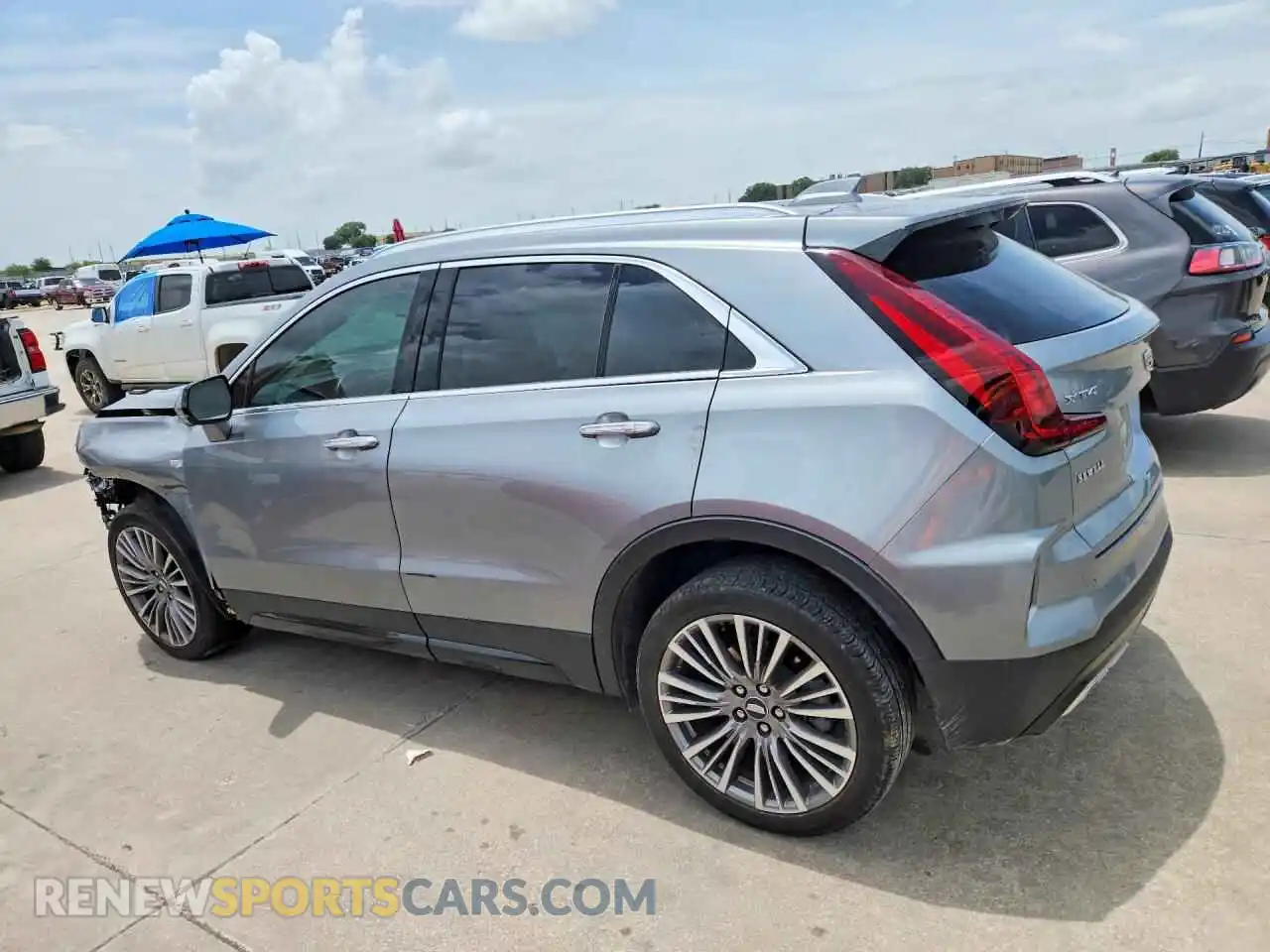 2 fotografías del automóvil dañado 1GYFZCR40SF155875 CADILLAC XT4 2025