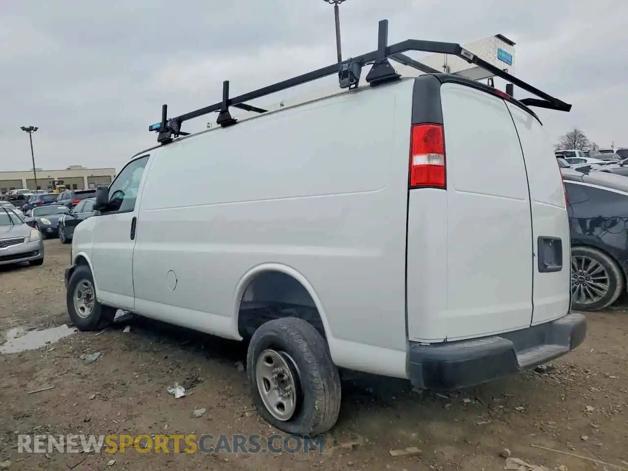 2 Photograph of a damaged car 1GCWGAFP9P1132596 CHEVROLET EXPRESS 2023